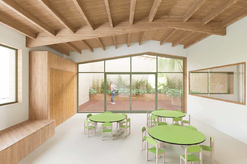 Une grande pièce garnie des petites tables en bois vertes, d'une grande vitre et d'une baie vitrée donnant sur une terrasse